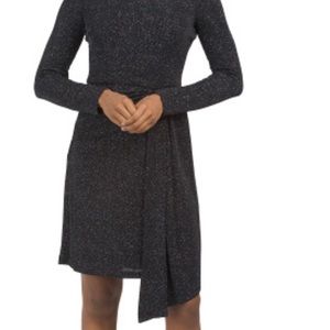 Long sleeve glitter knit dress with drape skirt. Perfect for an evening out.